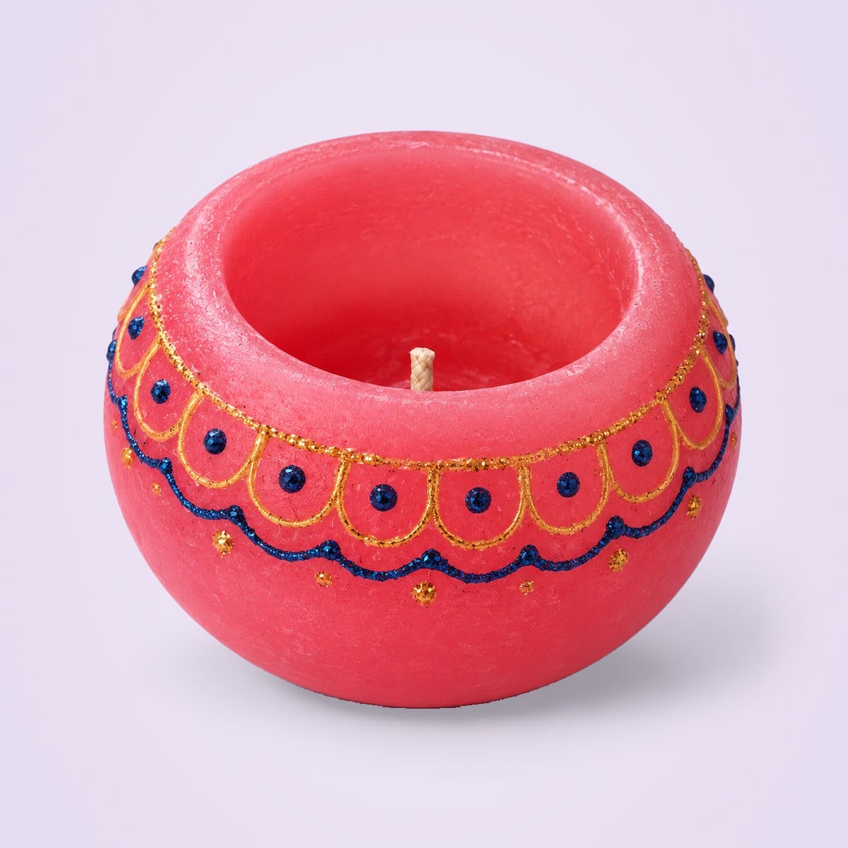 Pink aura orb candle with a painted gold and blue band
