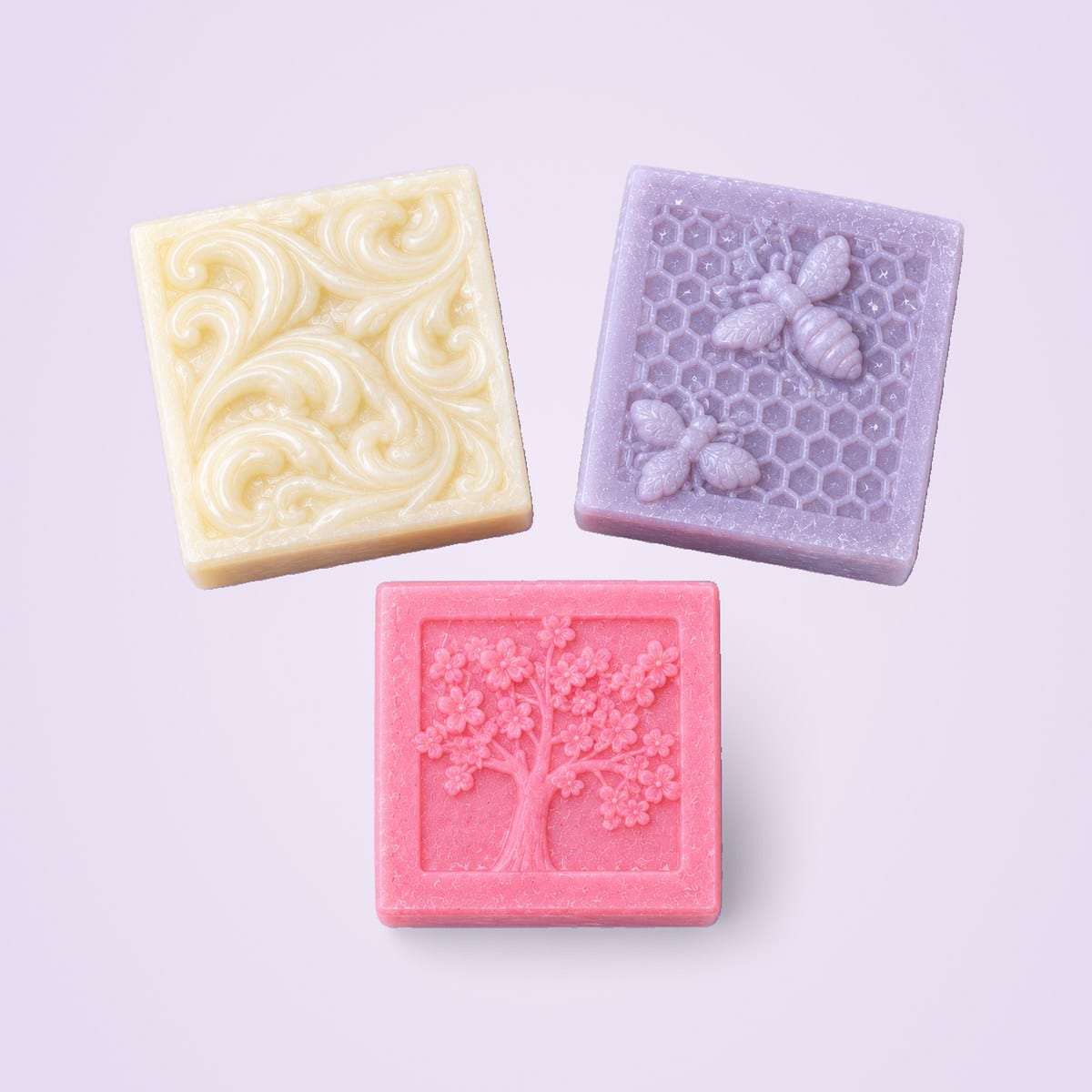 Ivory, pink and lavender bathing bars from above