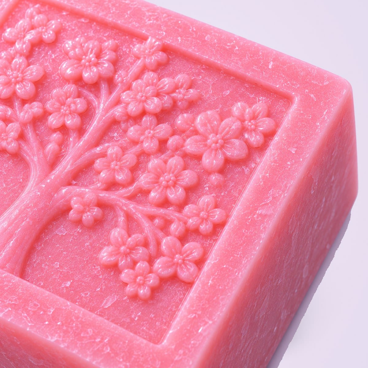 Close-up of the moulded tree on a pink bathing bar