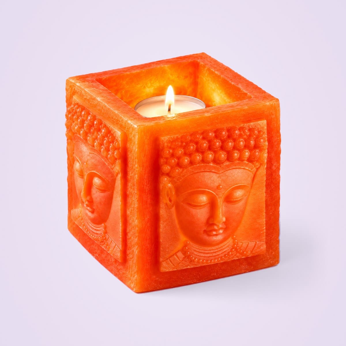 Buddha hurricane with a lit tealight glowing through the face