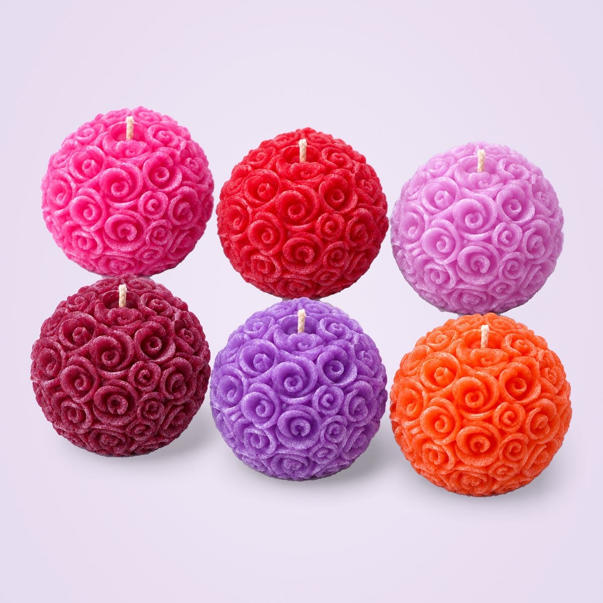 Rose ball candles in six colours: pink, red, lilac, maroon, purple and orange