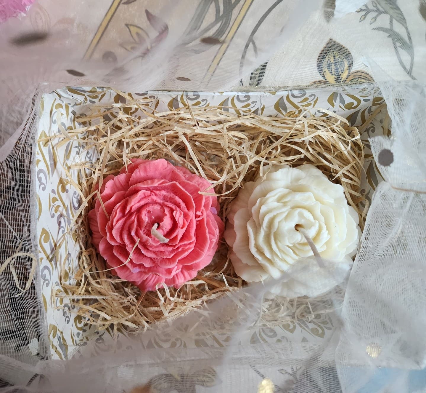 Pink and ivory peony candles in a gift box