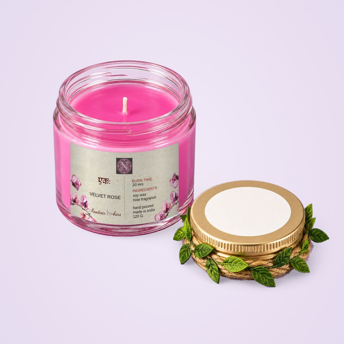 Open soy wax glass jar candle with its gold lid beside it