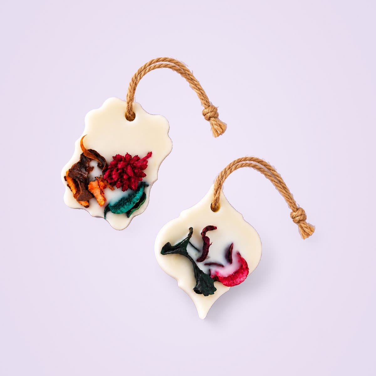 Two soy wax sachets from above, with jute cords