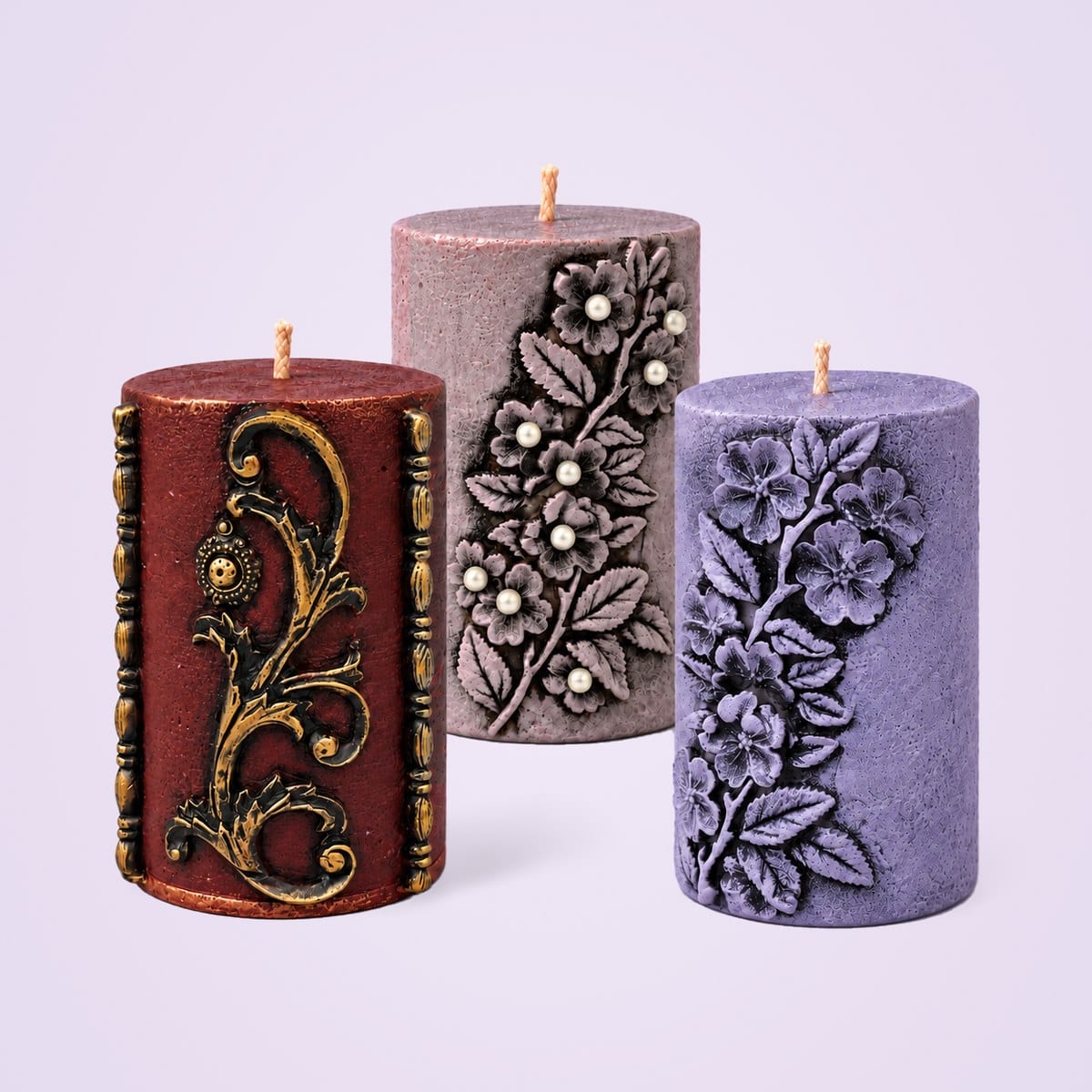 Maroon, mauve and lavender vintage pillar candles together