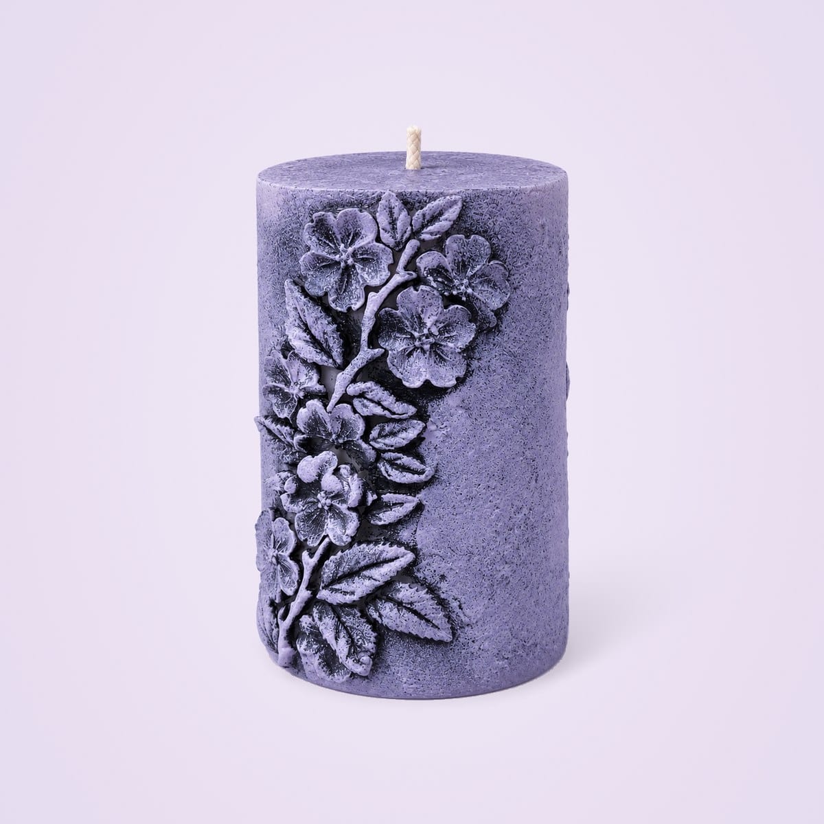 Lavender vintage pillar candle with antiqued floral relief